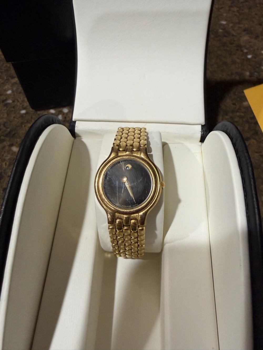 Movado Gold Tone Ladies Watch with Black Dial